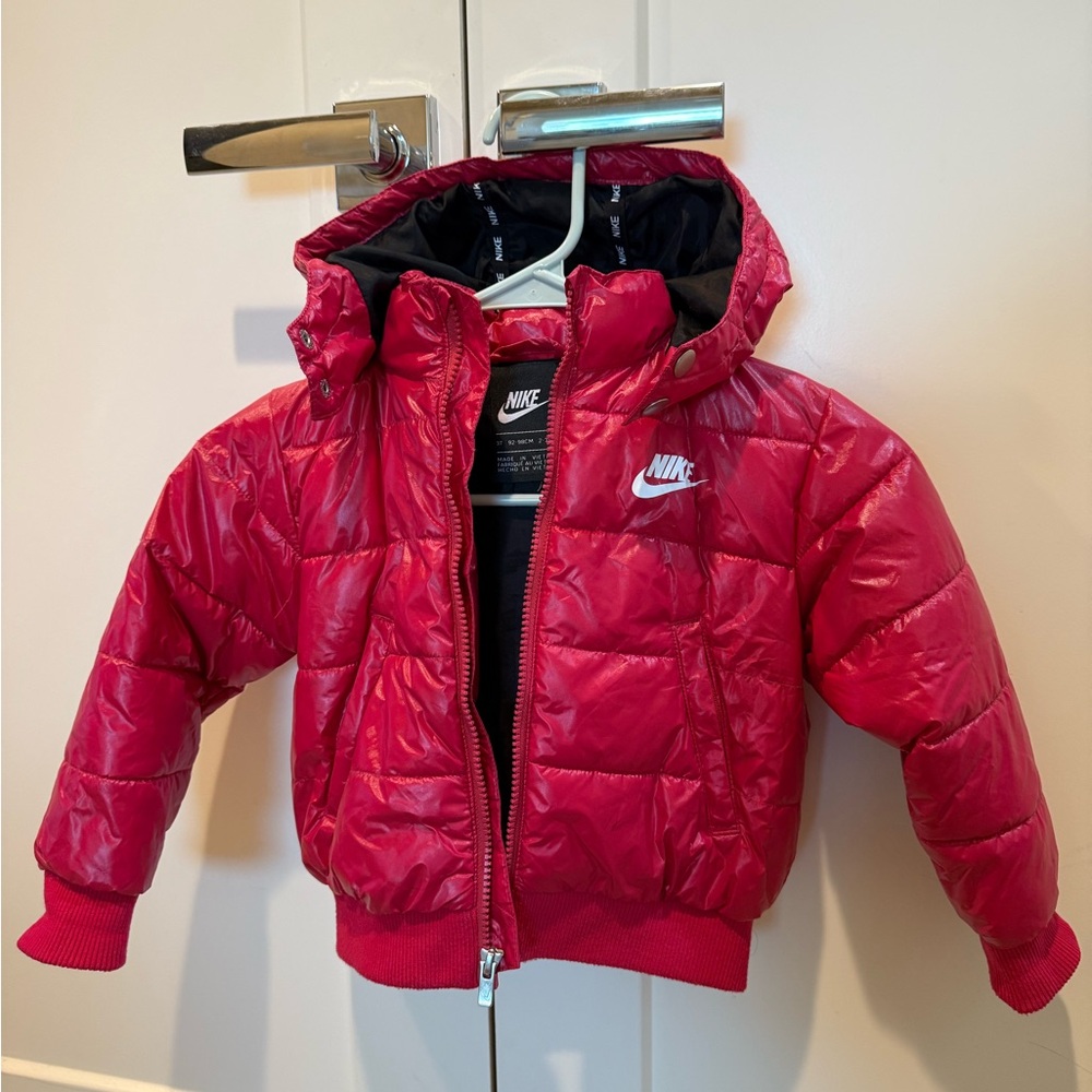 Kid’s pink Nike puffer jacket. Great condition